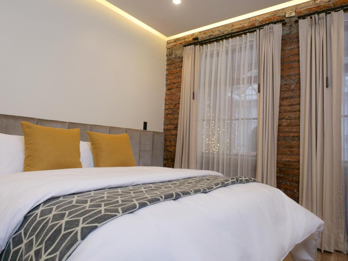 Wanderlot - Hotel Plaza Central Риобамба Екстериор снимка