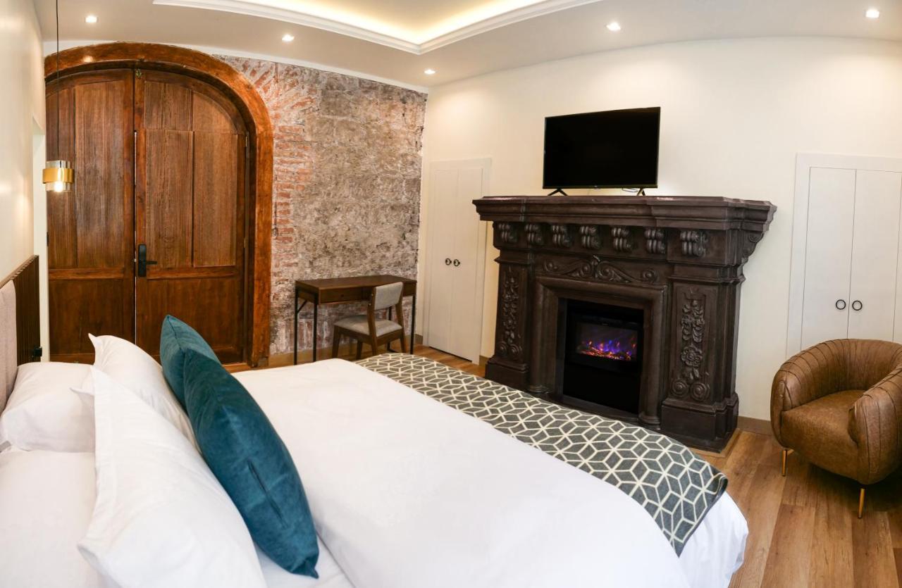 Wanderlot - Hotel Plaza Central Риобамба Екстериор снимка